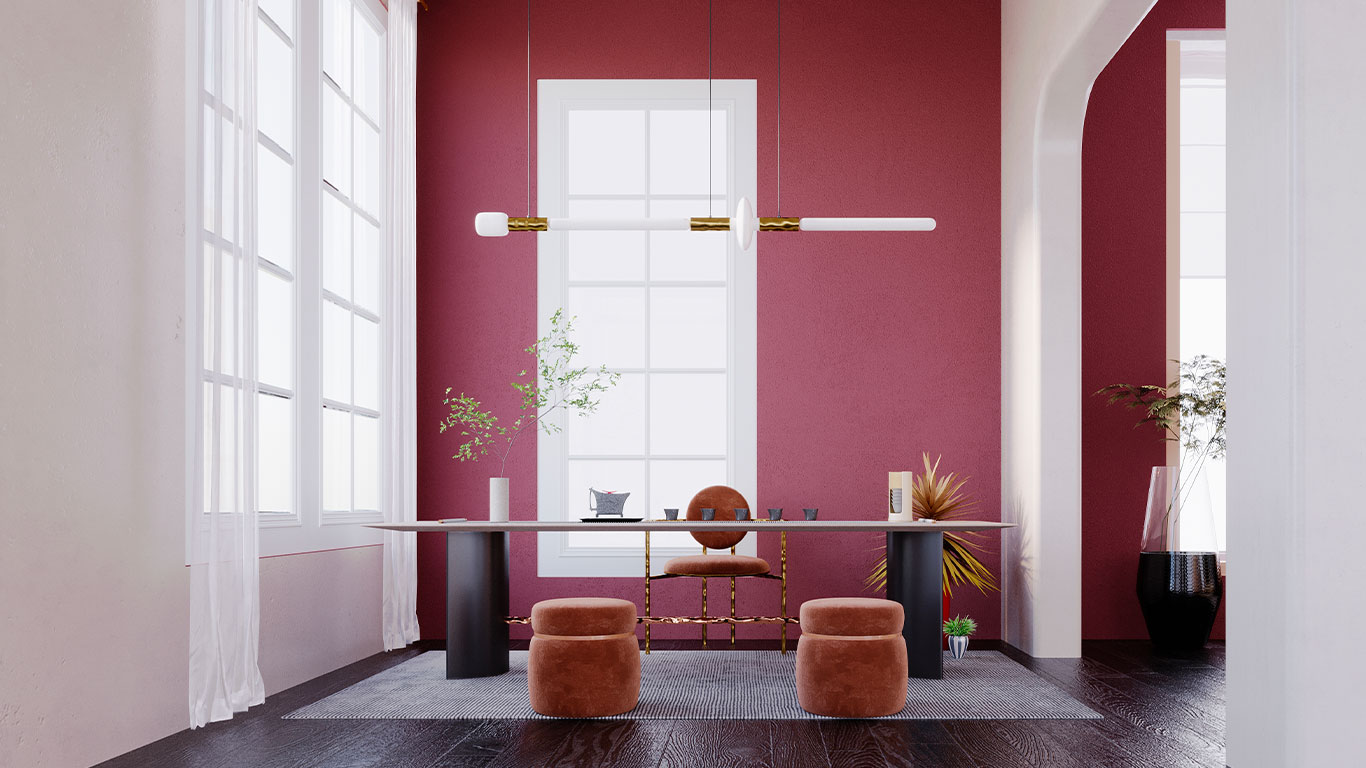 Espace intérieur bordeaux composé avec mobilier et éclairage contemporain